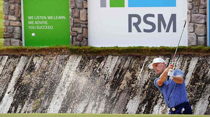 Ben Crane plays a shot from a bunker on the 17th hole during the first round of the 2021 RSM Classic at Sea Island, Ga.